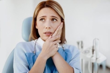 A patient suffering from gum disease receiving treatment at S&C Dental in Scottsdale, AZ